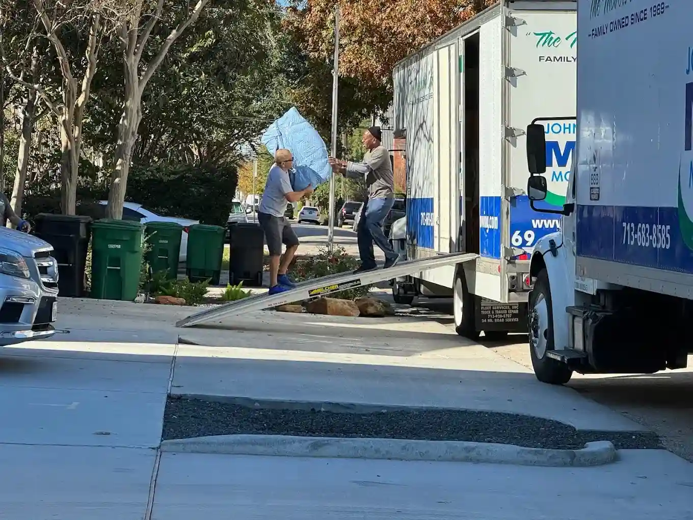 Johnnie T. Melia Moving & Storage long-distance moving truck loaded for an interstate move from Houston, TX